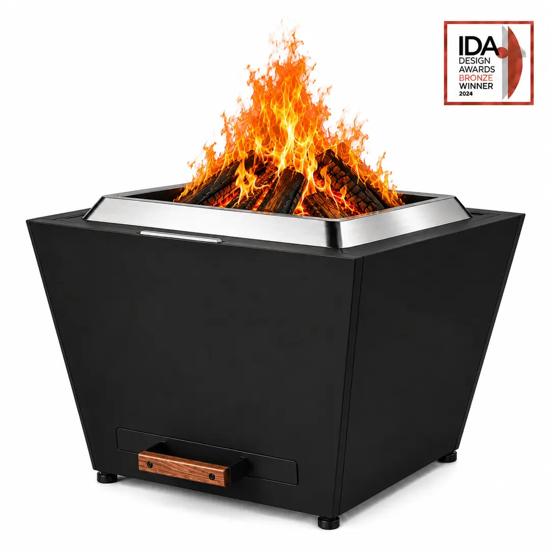 LEGACY HEATING 25 Inch Black Flat Smokeless Fire Pit with burning firewood, solid inverted-pyramid steel panels, a raised stainless steel fire ring, and a pull-out ash pan with a wooden handle.