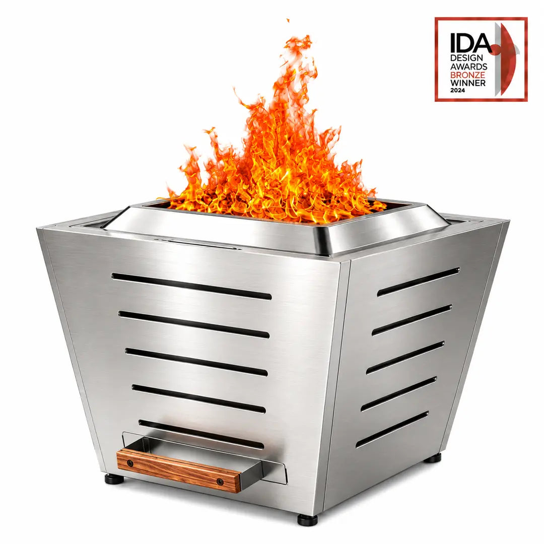 LEGACY HEATING 25-inch stainless steel slatted smokeless fire pit with flames, tapered inverted-pyramid panels, five horizontal cutout slots that shorten from top to bottom, a raised stainless steel fire ring and pull-out ash pan.